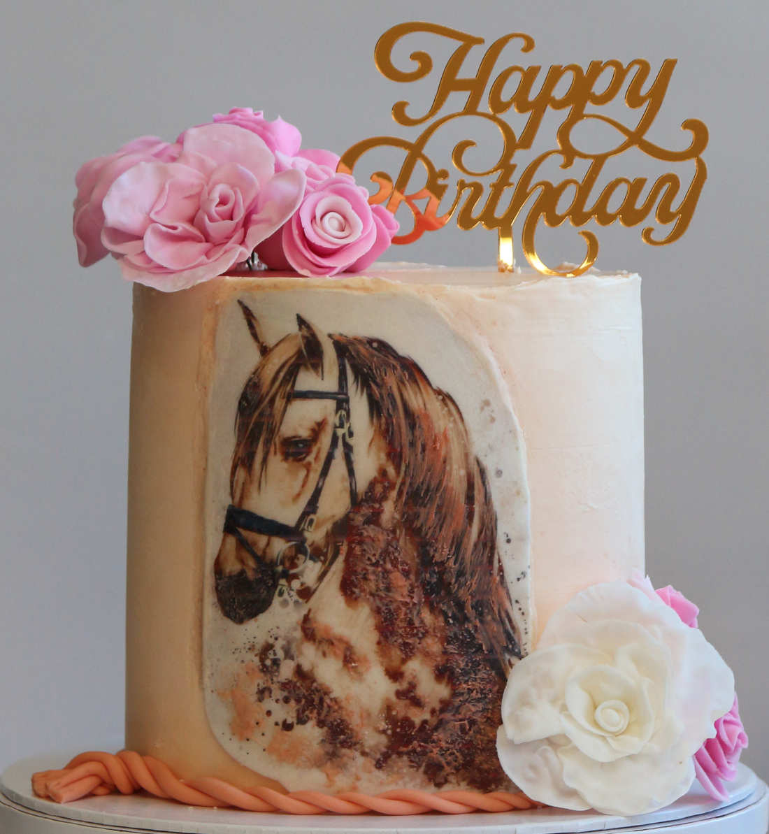 Birthday cake with horse and flowers