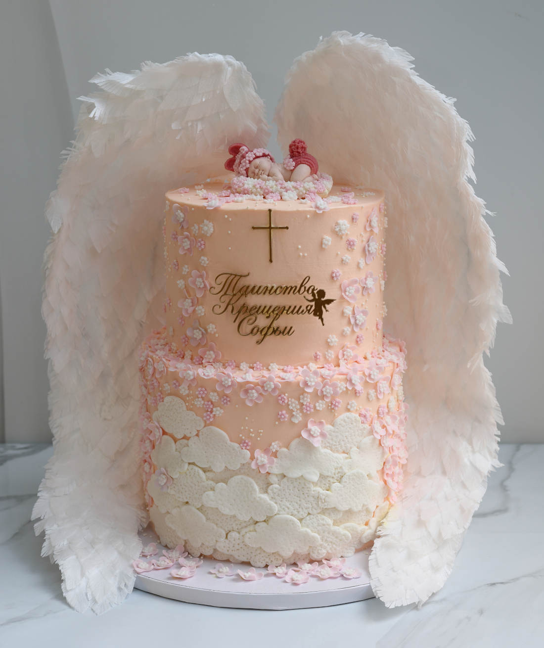 A cake with wings for a child's christening