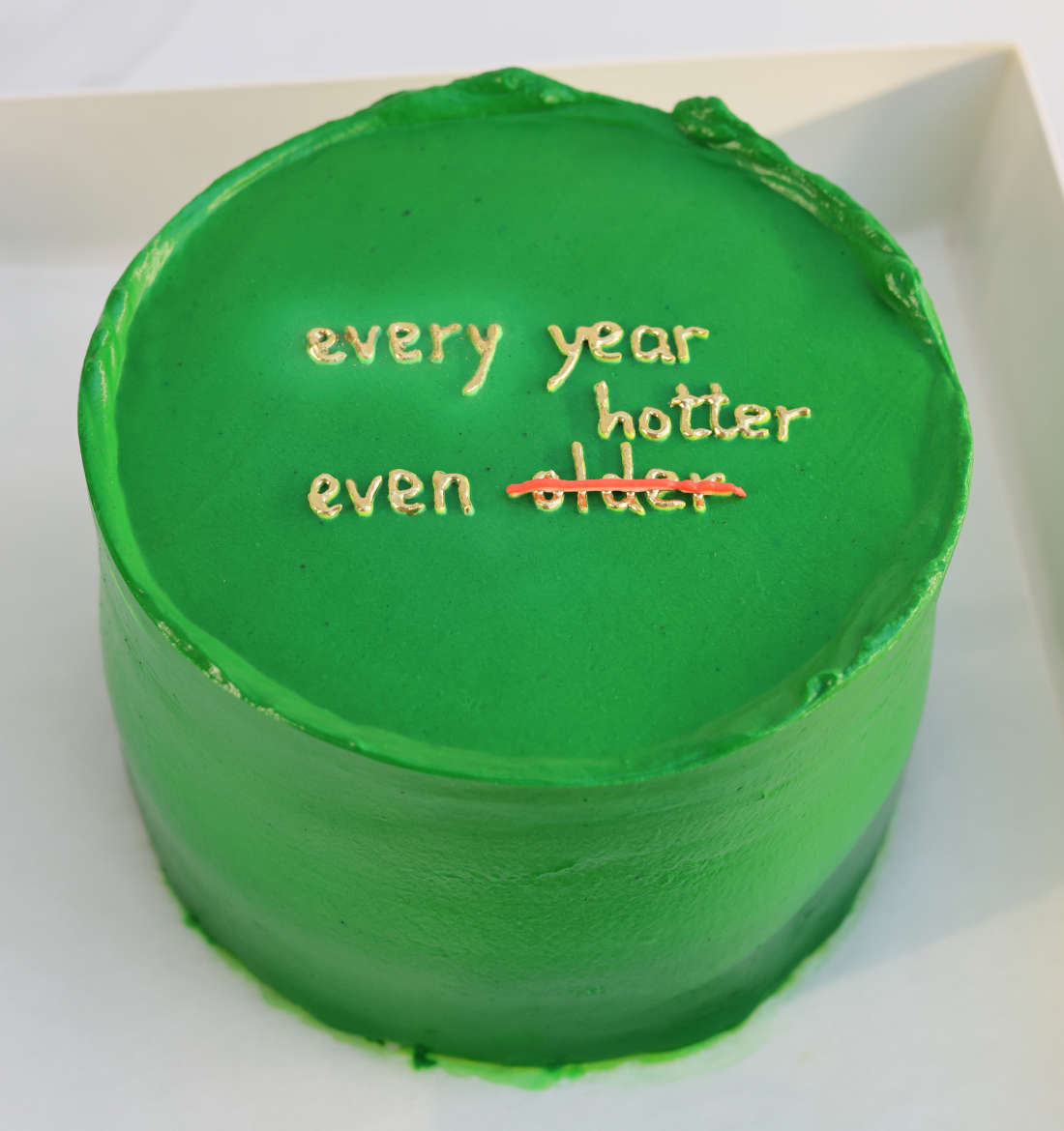 Green bento cake with an inscription