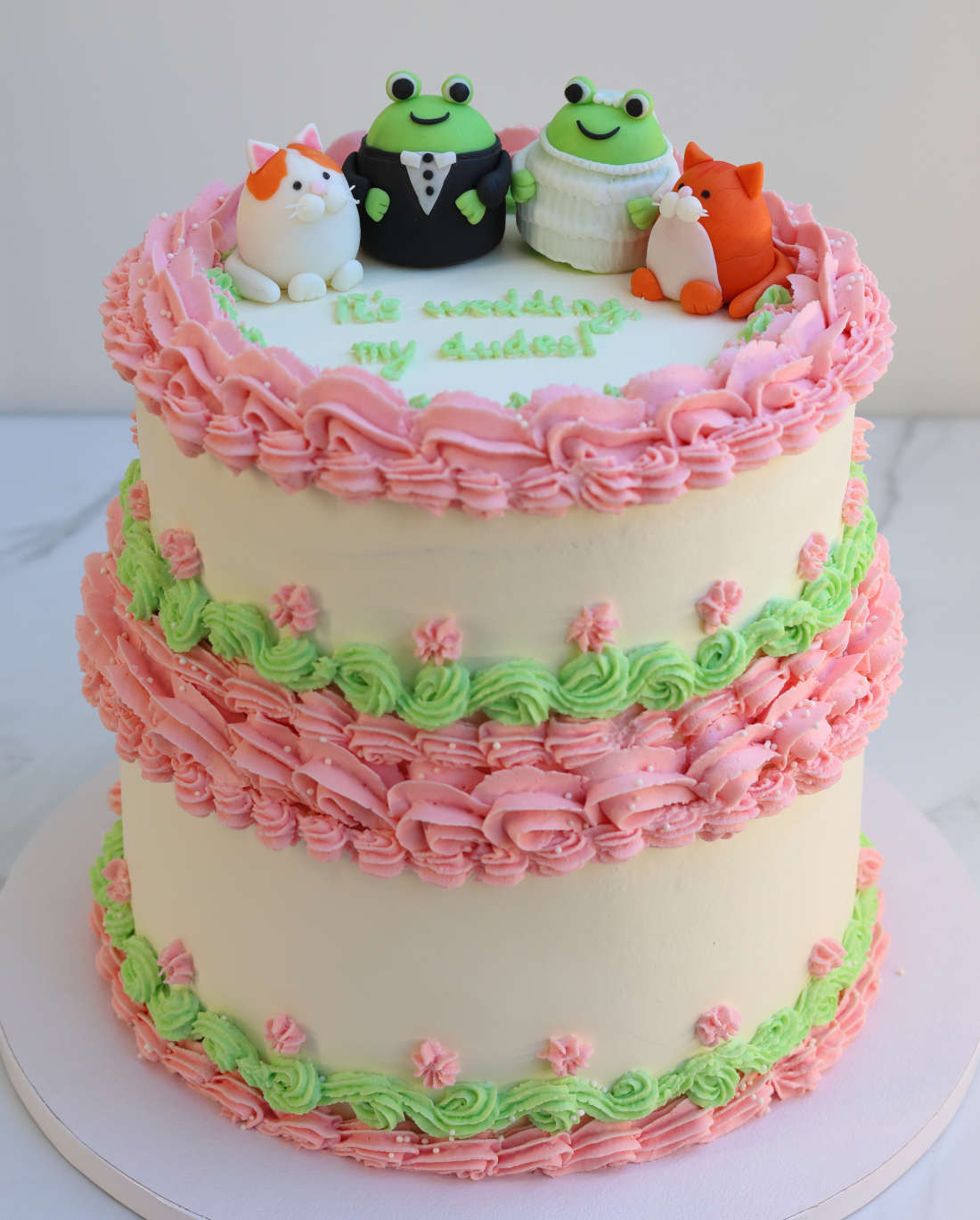 Awesome wedding cake in Vilnius with edible figures