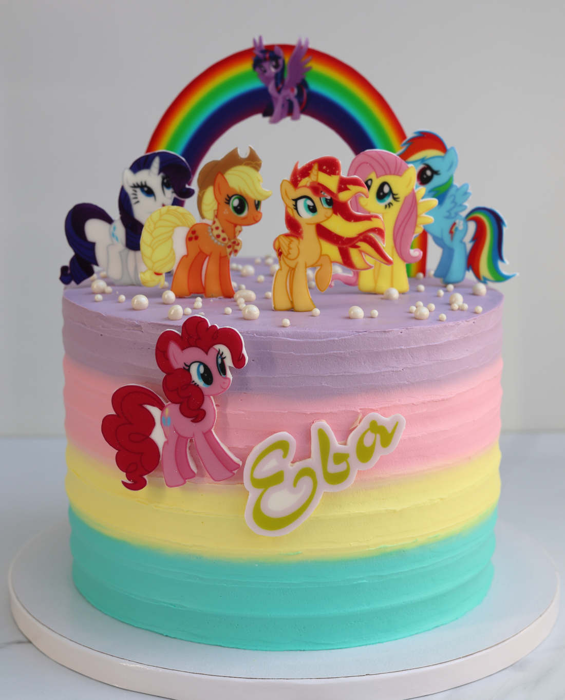 Tortas su vaivorykšte ir poni mergaitei