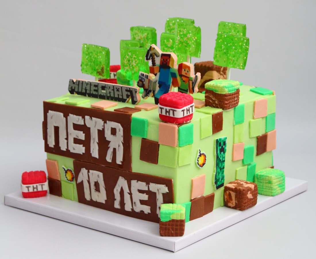 Print on a Minecraft cake and an inscription made from fondant icing