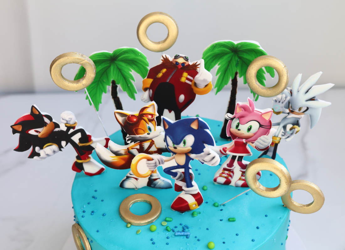 Mėlynas Sonic tortas su žiedais ir žaidimo personažais